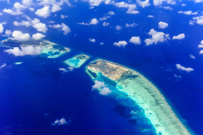 North and South Malé Atoll Guide (Kaafu Atoll): Resorts, Local Islands & Everything You Need to Know 1 Kaafu Atoll Maldives aerial view of North and South Malé Atoll with coral reef and lagoon