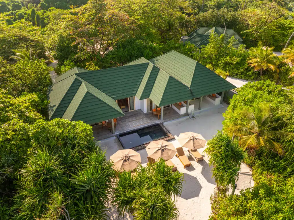 How to Choose a Maldives Resort: The Complete Decision Guide 9 aerial view of three bedroom beach villa at Siyam World Maldives with private pool surrounded by tropical forest