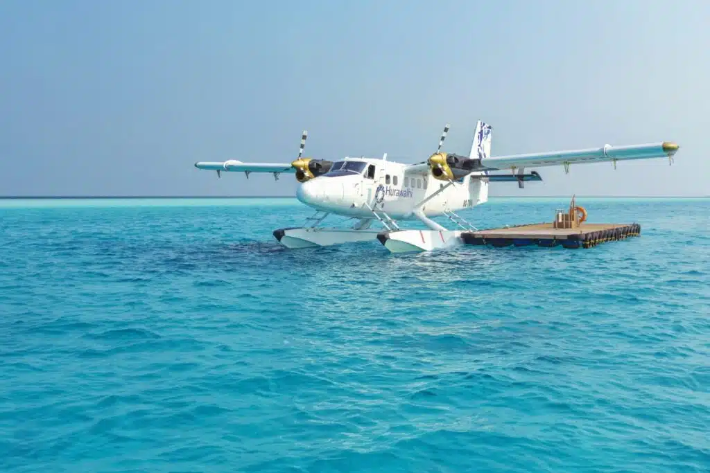 How to Choose a Maldives Resort: The Complete Decision Guide 1 seaplane docked on turquoise water in the Maldives for resort transfer to Hurawalhi Island