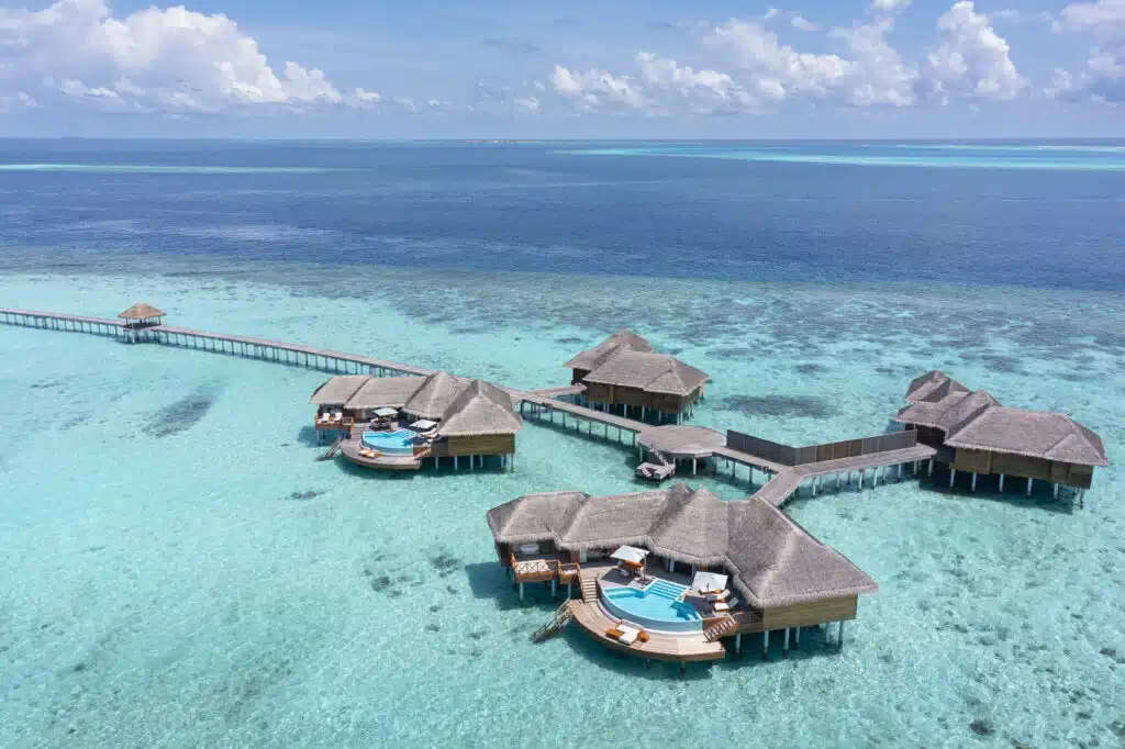 I migliori resort alle Maldive vicino a Malé: 10 isole top vicine all'aeroporto 14 vista aerea dell'Huvafenfushi Maldives e del suo famoso house reef nel North Malé Atoll