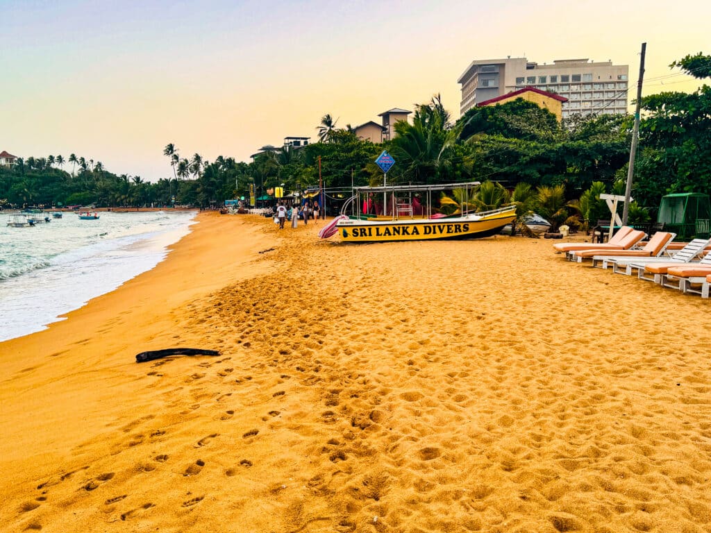 Best Beaches in Sri Lanka: A Guide by Coast & Season 1 best beaches in Sri Lanka Unawatuna curved bay with clear turquoise water