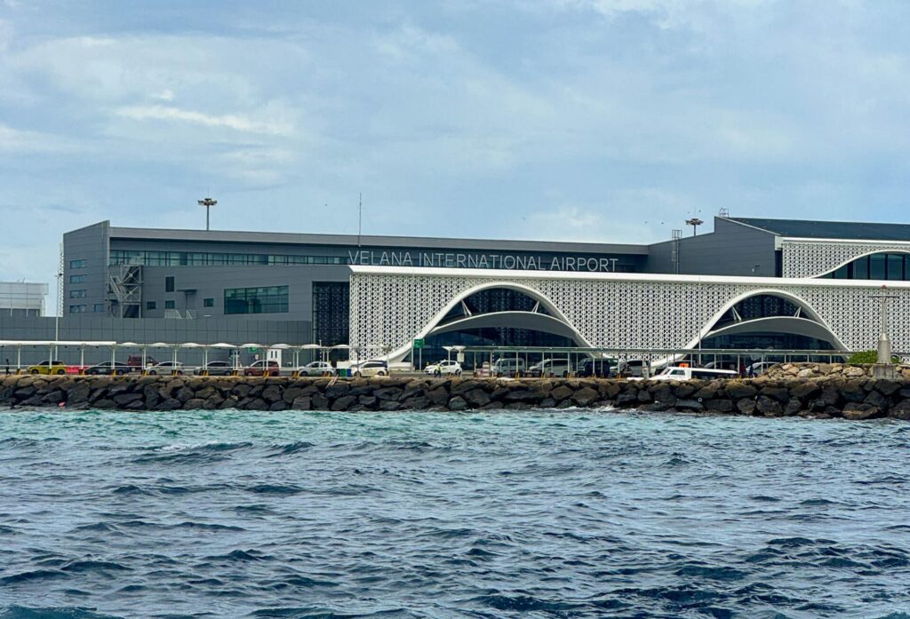 How to Get Around Maldives: The Complete Transport & Transfer Guide 1 Velana International Airport arrival hall Maldives with passengers