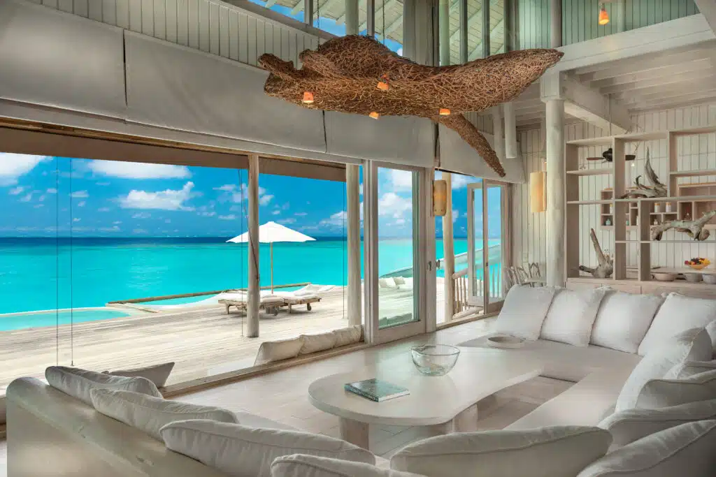 How to Choose a Maldives Resort: The Complete Decision Guide 17 Alt text:
bright living room interior of overwater villa at Soneva Jani Maldives with pool deck and turquoise ocean view
