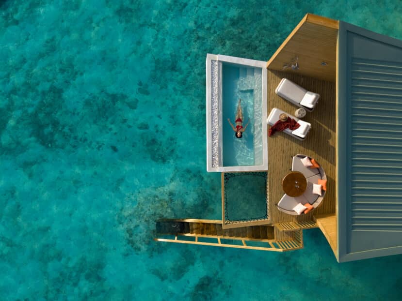 North and South Malé Atoll Guide (Kaafu Atoll): Resorts, Local Islands & Everything You Need to Know 7 Centara Mirage Lagoon Maldives overwater sunrise pool villa with private deck at dawn
