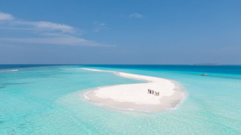 North and South Ari Atoll Guide (Alif Alif & Alif Dhaal): Resorts, Local Islands & Everything You Need to Know 19 seaplane transfer to Ari Atoll Maldives flying over turquoise reef and island