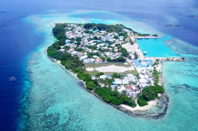 North and South Malé Atoll Guide (Kaafu Atoll): Resorts, Local Islands & Everything You Need to Know 38 Gulhi local island Kaafu Atoll Maldives aerial with white sand beach and reef