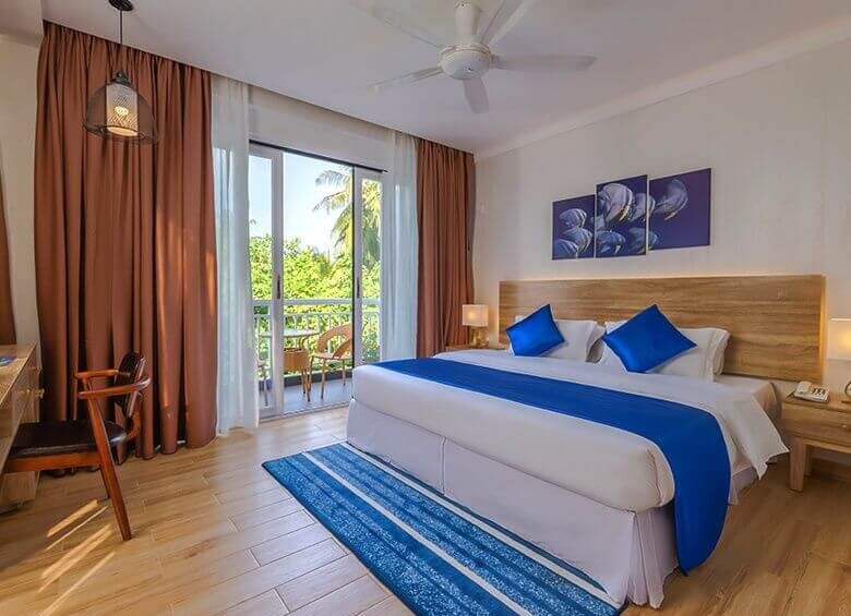 Best Hotels on Local Islands in Maldives (By Budget): Complete Guide for 2026 25 Dhiguveli Dhigurah guesthouse with garden view and comfortable rooms
