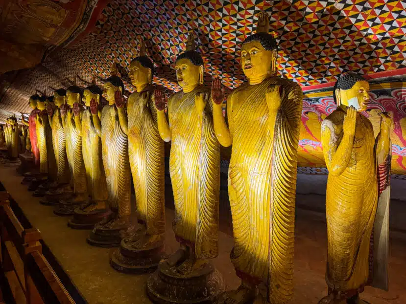Sri Lanka Cultural Triangle: Ancient Cities, Temples & Where to Stay 2 Dambulla Cave Temples Sri Lanka interior with Buddha statues and painted murals