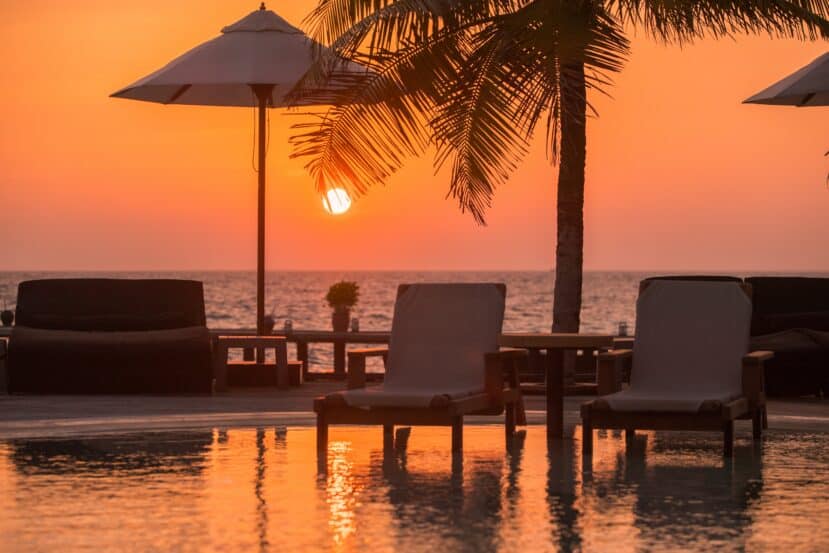 Lhaviyani Atoll Maldives: A Complete Guide to Three Stunning Atolls 5 Komandoo Island Resort infinity pool with sunset view over Lhaviyani lagoon