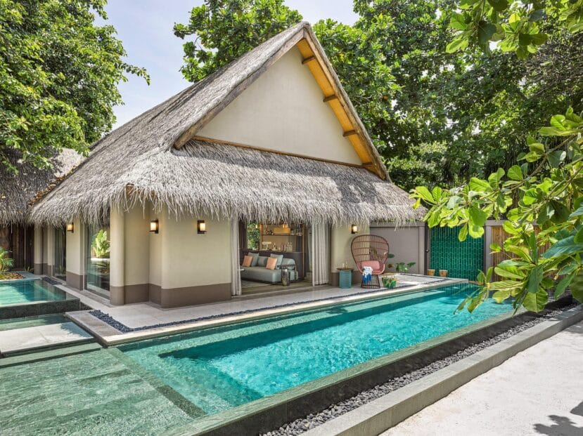 How to Choose the Best Atoll in Maldives: A Complete Area & Stay Guide 16 JOALI Maldives Raa Atoll beach villa exterior with art installations and turquoise lagoon
