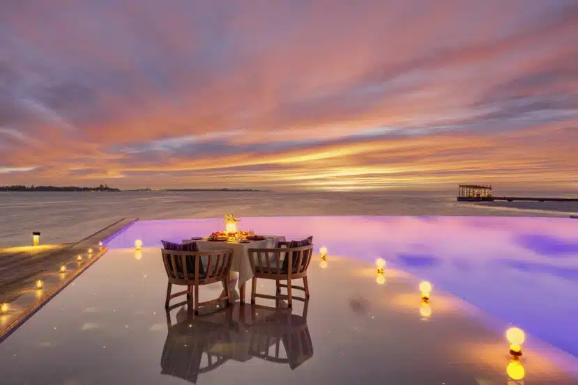 Lhaviyani Atoll Maldives: A Complete Guide to Three Stunning Atolls 6 Kudadoo Maldives Private Island destination dining on overwater platform at sunset
