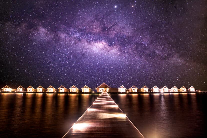 North and South Ari Atoll Guide (Alif Alif & Alif Dhaal): Resorts, Local Islands & Everything You Need to Know 10 Lux South Ari Atoll resort aerial view with beach and overwater villas at sunset