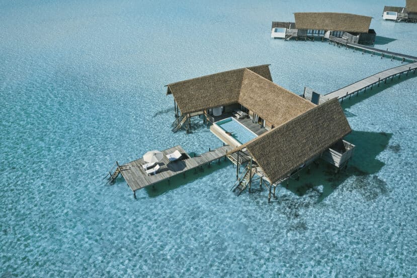North and South Malé Atoll Guide (Kaafu Atoll): Resorts, Local Islands & Everything You Need to Know 25 COMO Cocoa Island South Malé Atoll aerial with overwater villas designed as traditional dhoni