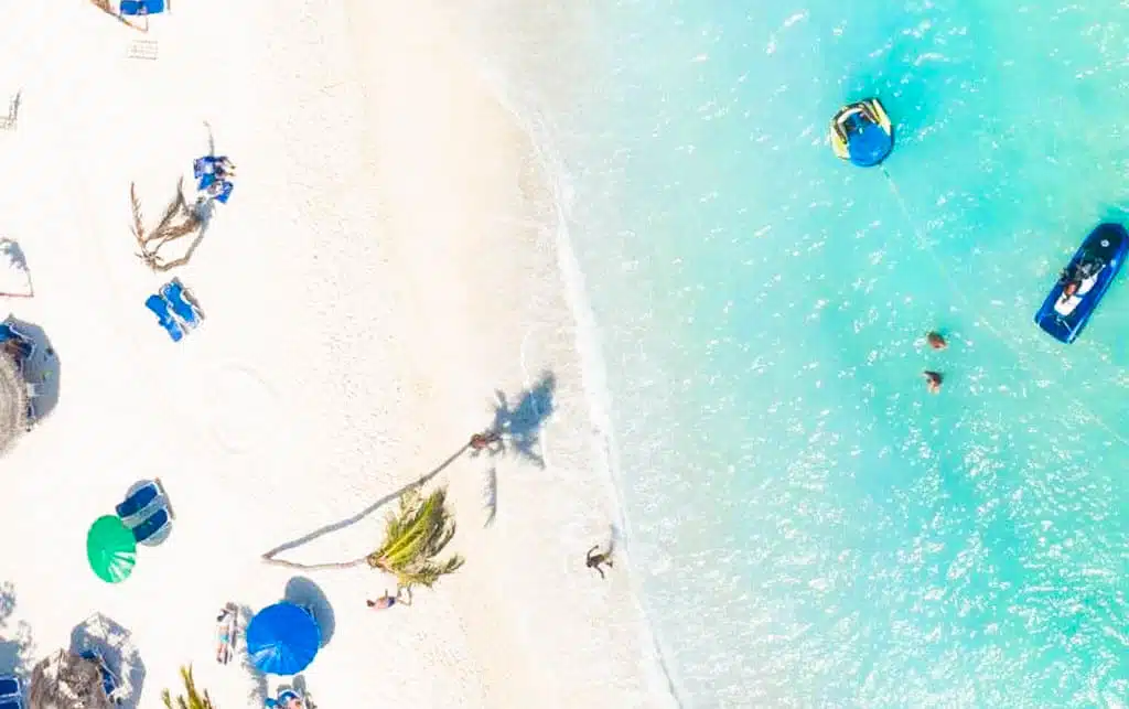 Maafushi Maldives: The Complete Budget Travel Guide to the Most Popular Local Island 15 Maafushi local island South Malé Atoll beach with guesthouse buildings and palms