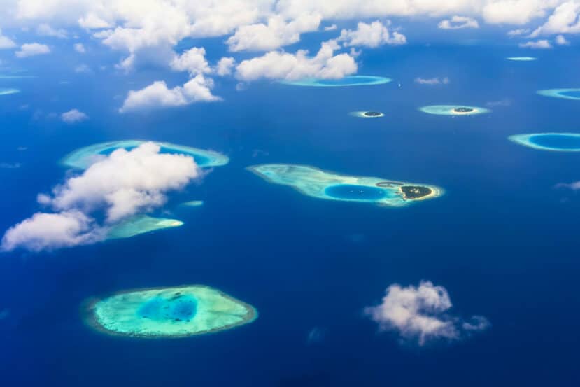 How to Choose the Best Atoll in Maldives: A Complete Area & Stay Guide 4 North Malé Atoll aerial view Maldives with resort islands and capital Malé in background