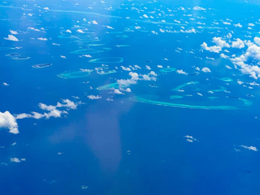 How to Choose the Best Atoll in Maldives: A Complete Area & Stay Guide 15 Raa Atoll Maldives aerial view of remote northern atoll with JOALI and Finolhu