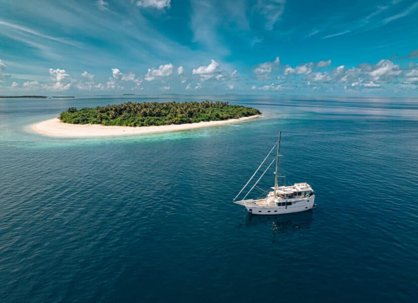 How to Choose the Best Atoll in Maldives: A Complete Area & Stay Guide 33 Soneva in Aqua liveaboard exploring uninhabited islands and reef in remote Maldives atoll