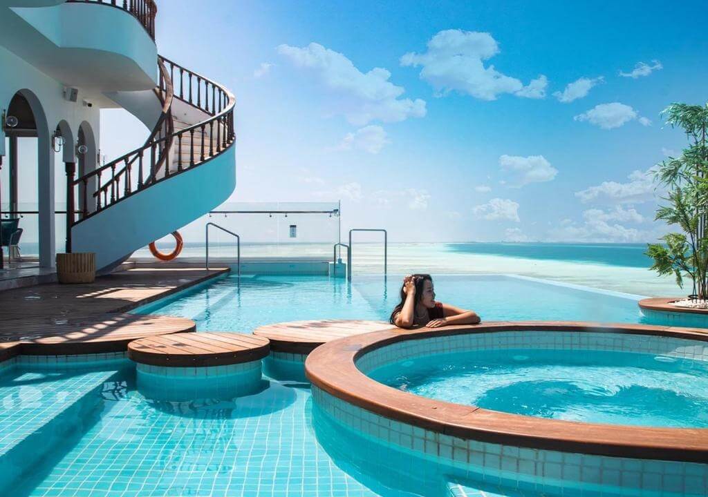 Dhiffushi Maldives: Budget Island with Easy Transfers 2 Stone Hotels Dhiffushi Maldives beachfront hotel exterior on north beach