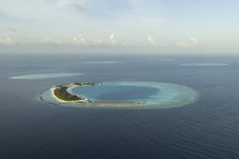 Lhaviyani Atoll Maldives: A Complete Guide to Three Stunning Atolls 13 Sun Siyam Iru Veli Maldives resort island aerial view surrounded by turquoise lagoon