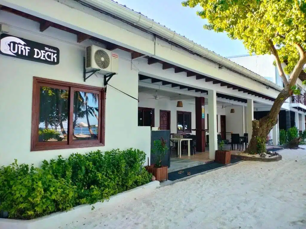 Best Hotels on Local Islands in Maldives (By Budget): Complete Guide for 2026 5 Surf Deck Maldives Thulusdhoo guesthouse with surfboard storage and ocean view