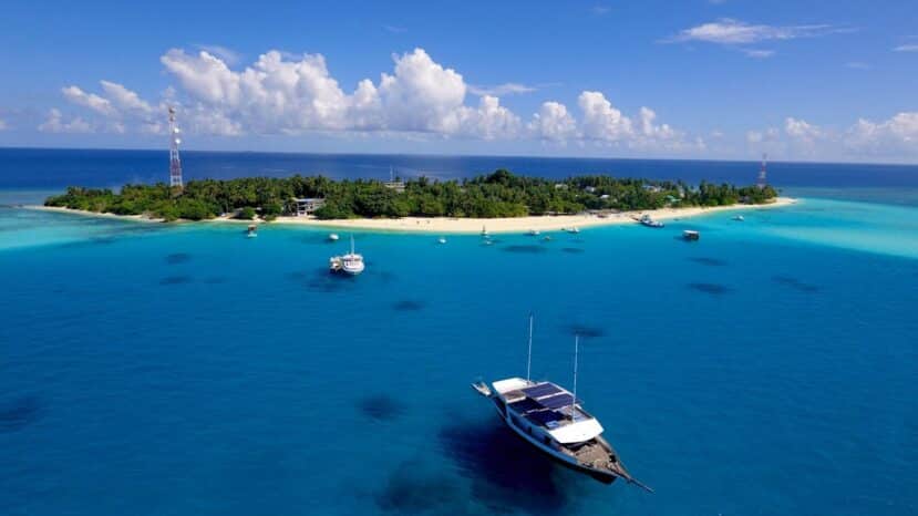 Southern Atolls Maldives: Your Complete Guide to Gaafu, Laamu, Thaa & Beyond 10 Fulidhoo local island aerial view Vaavu Atoll Maldives small green island with beach