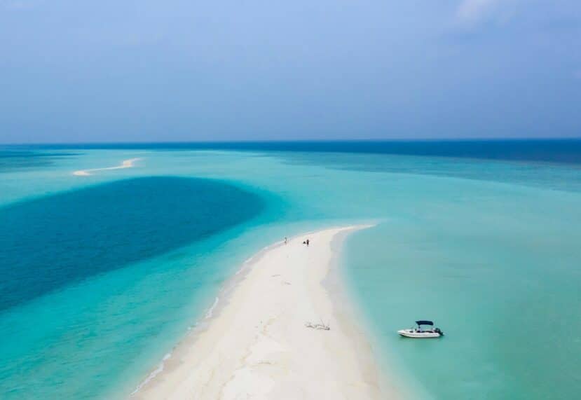 Southern Atolls Maldives: Your Complete Guide to Gaafu, Laamu, Thaa & Beyond 14 seaplane or resort aerial view southern Maldives atoll turquoise water and coral reef